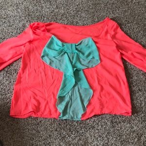 Scoop back with bow blouse